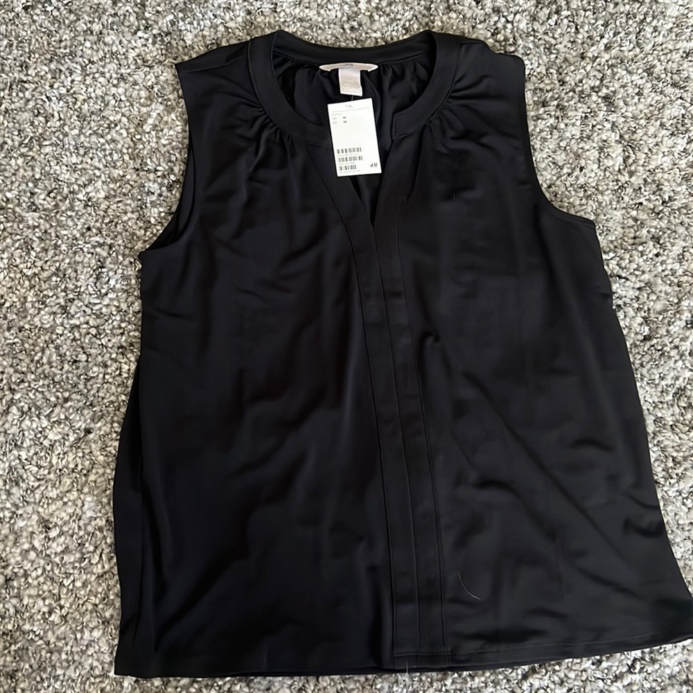 Brand new H&M black sleeveless blouse, size medium, still has tag on